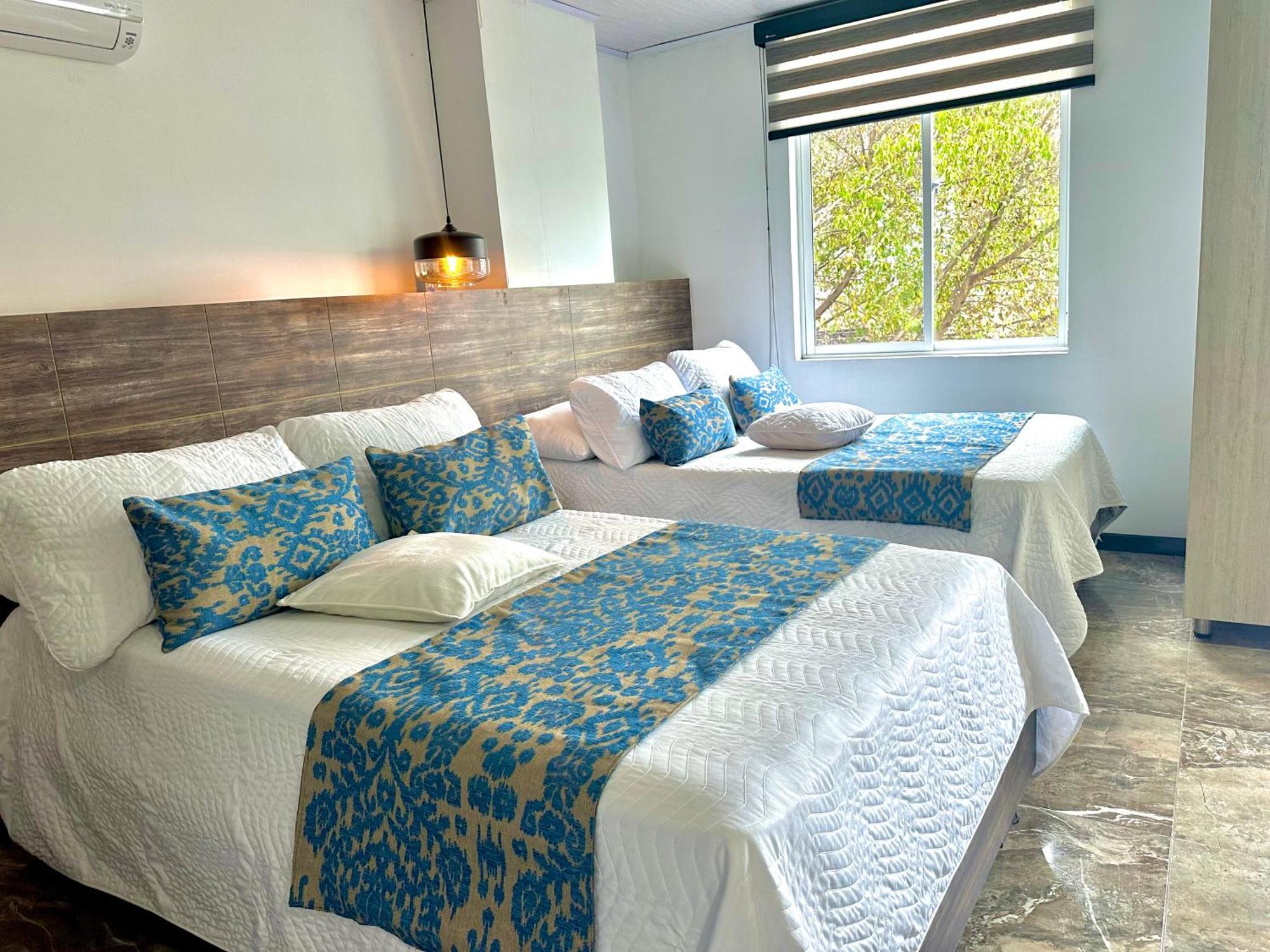 Hotel Los Maderos Кали Экстерьер фото